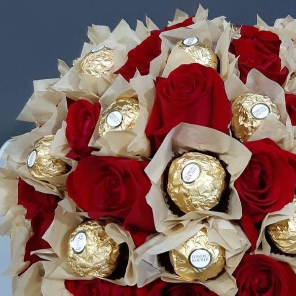 Chocolate and roses in box