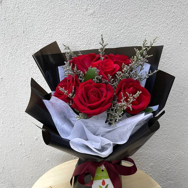 Red Rose bouquet in black wrapping
