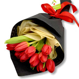 Red Tulip in black wrapping