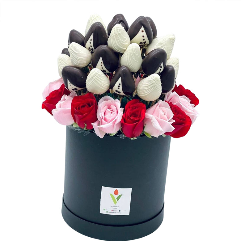 Flowers and chocolate in Box