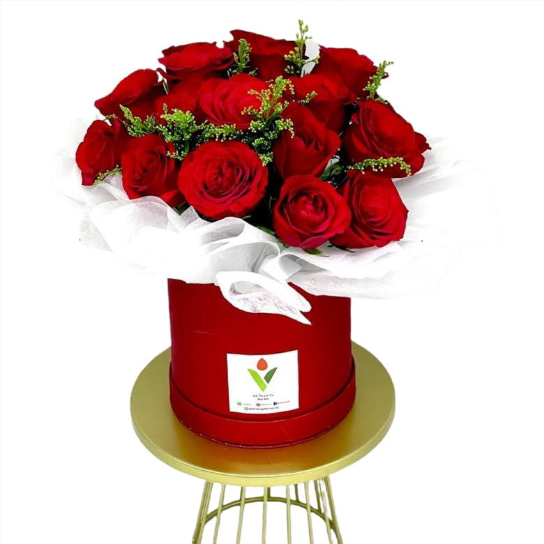 red rose in box arrangement