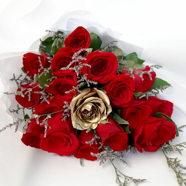 Red rose bouquet with gold rose
