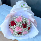 fresh carnations and roses bouquet